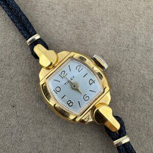 Vintage Timex Hand Wind 1950's Small wrist size Gold Tone Watch